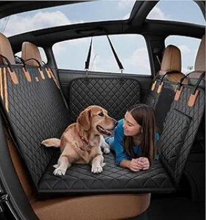 Dog and person in a car with a black quilted car seat cover.