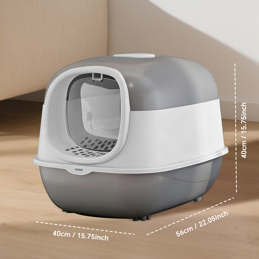 Gray and white cat litter box with dimensions on a wooden floor