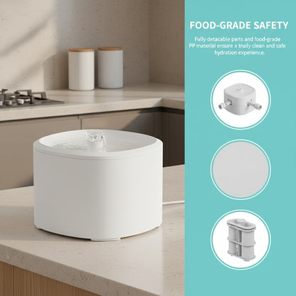 White pet water fountain on a kitchen counter with food-grade safety features highlighted.